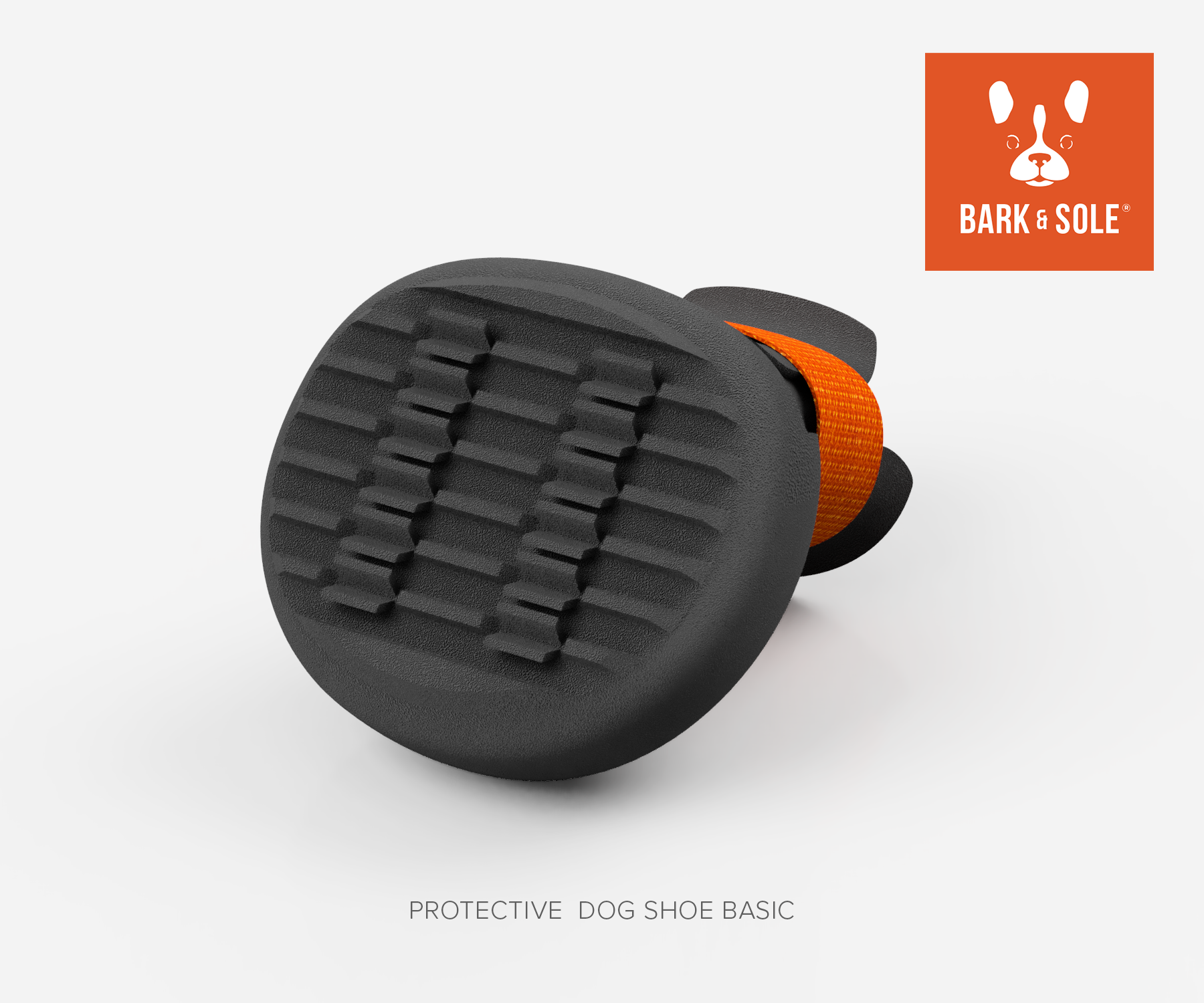 Black protective dog shoe with orange accent on a white background, featuring the Bark & Sole logo.